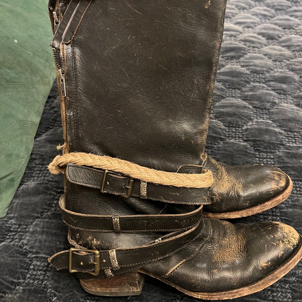 Tall, black leather freebird boots